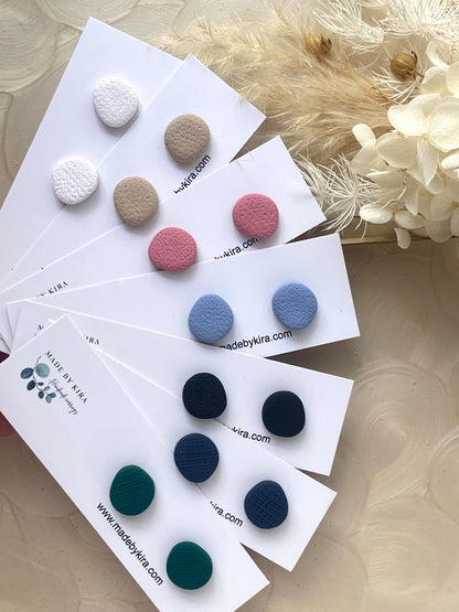small organicallyround stud earrings in 7 different colours